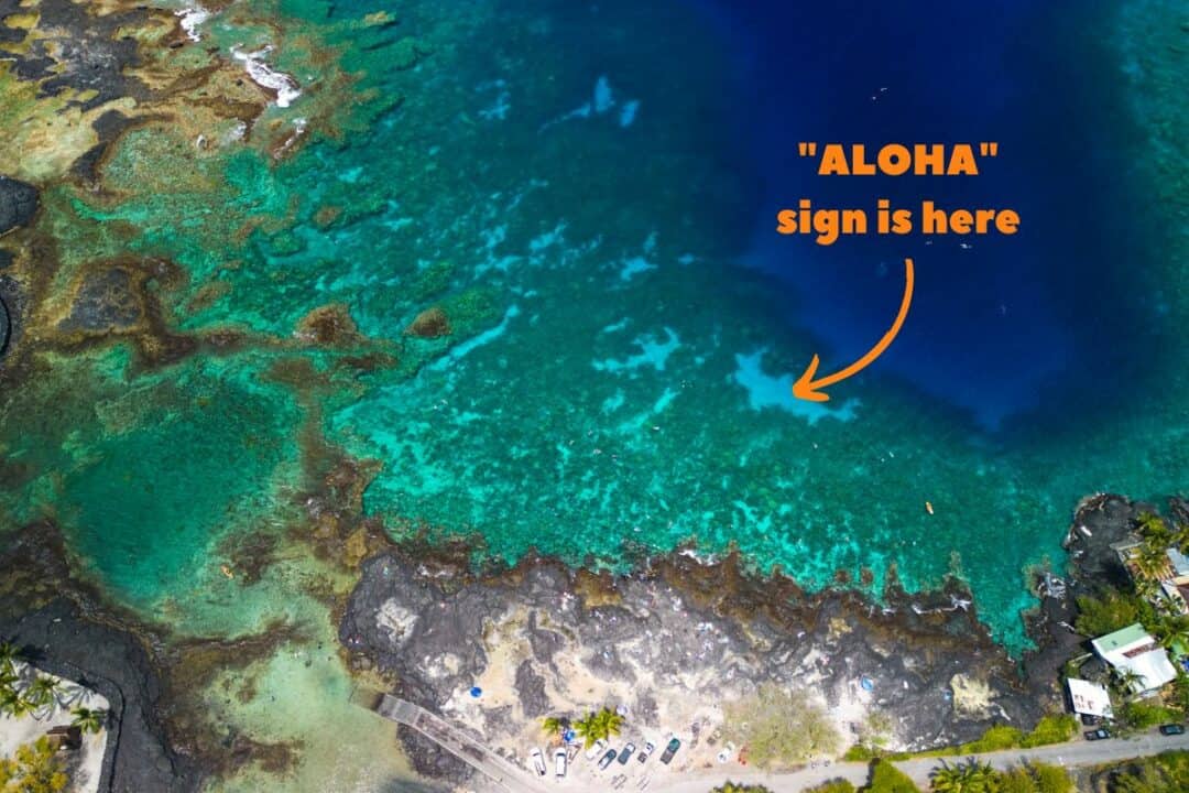 aerial view of two step reef honaunau bay aloha sign
