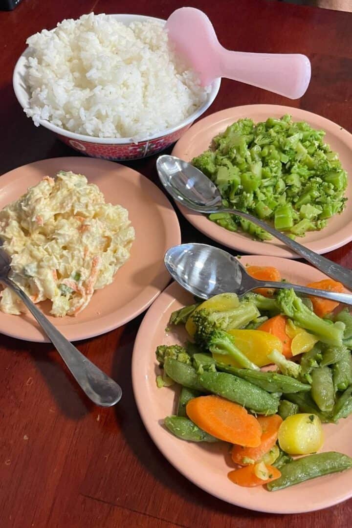 Experiencing Old Hawai‘i: Our Stay at the Historic Manago Hotel 14 The Manago Hotel Restaurant's side dishes. Rice, steamed broccoli, mac salad, mixed veggies