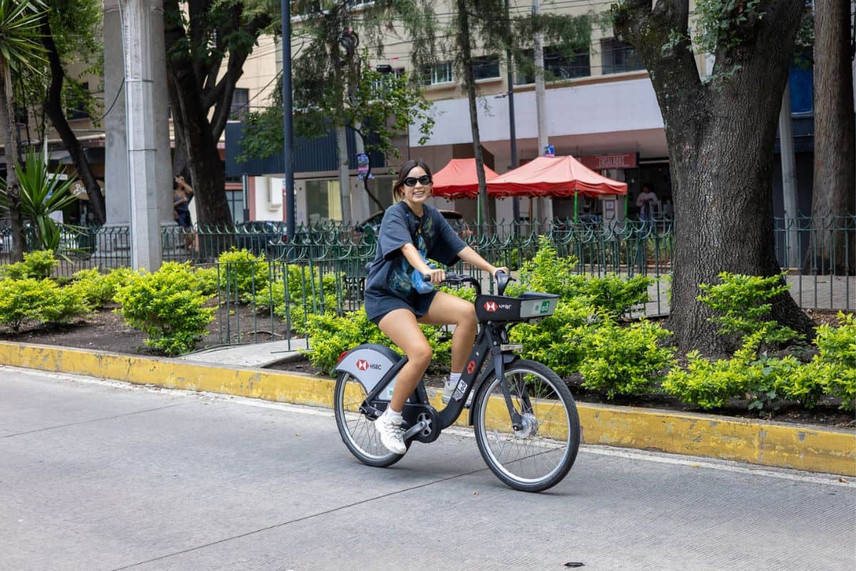 Exploring La Condesa: Things to Do in Mexico City's Trendiest Neighborhood 1 Chloe riding a bike share bicycle through La Condesa during Mexico City's "Muevete" on Sunday!
