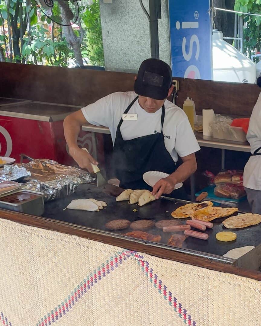 line cook at las estacas mercadito food stall