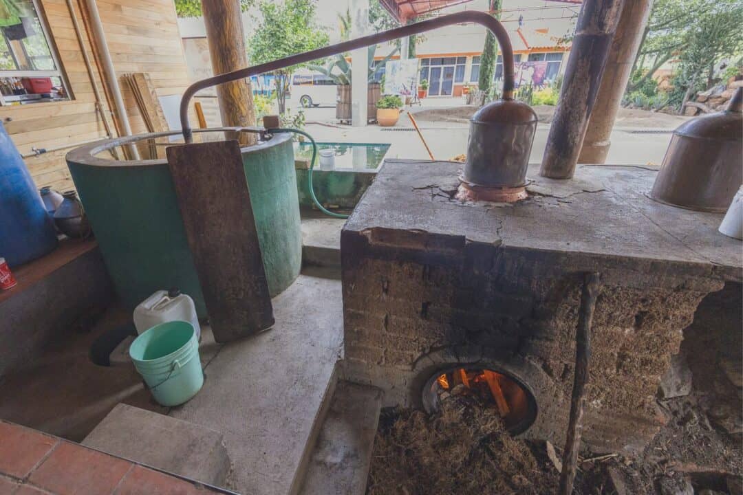 Oaxaca Mezcal Tour: Behind the Scenes of an Active Distillery 8 Mezcal distillation in copper still