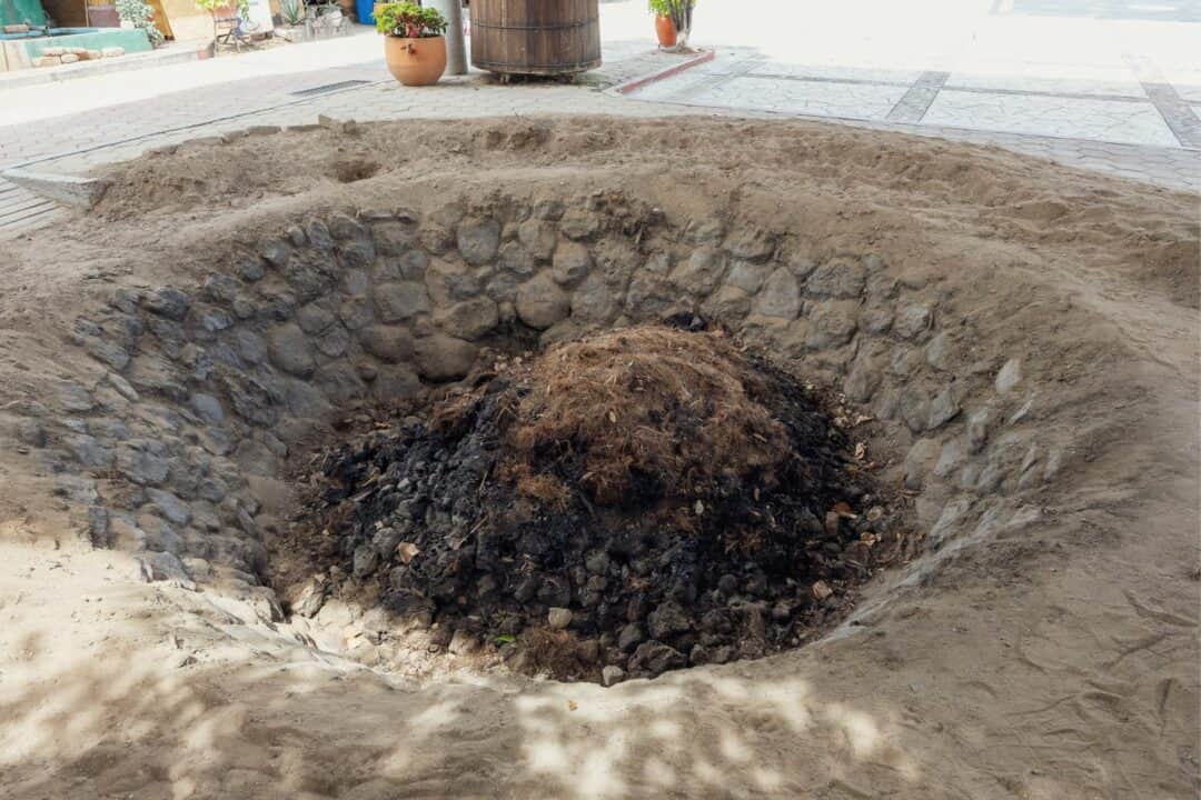 Oaxaca Mezcal Tour: Behind the Scenes of an Active Distillery 5 Pit for roasting agave to make mezcal