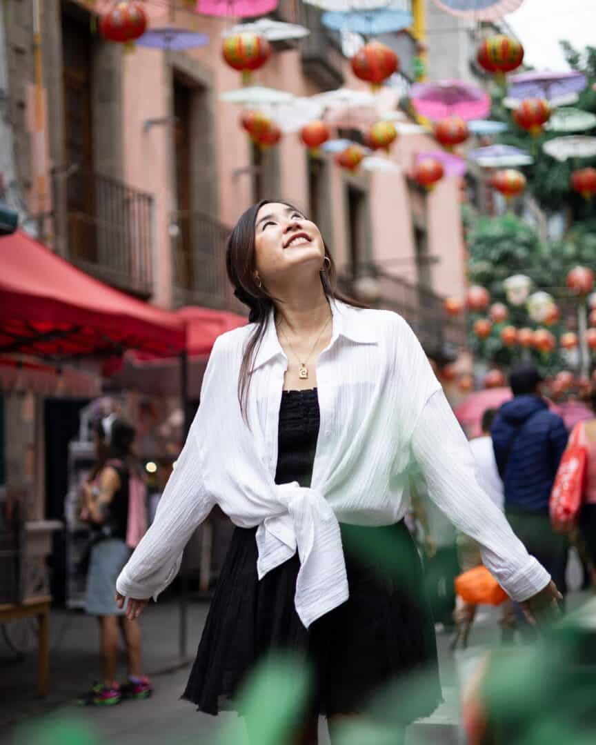 Chloe posing for an Instagram photo at Barrio Chino in Mexico City