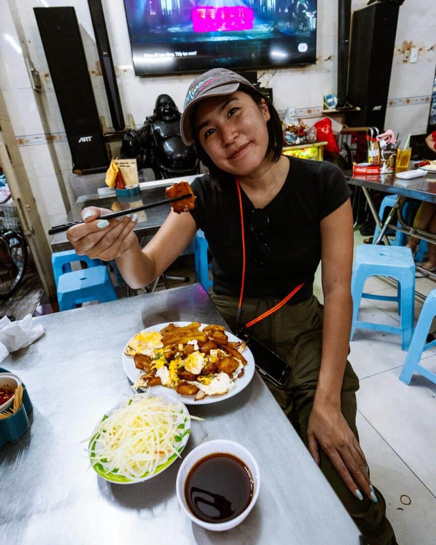 Chloe eating fried pasta, fried dough