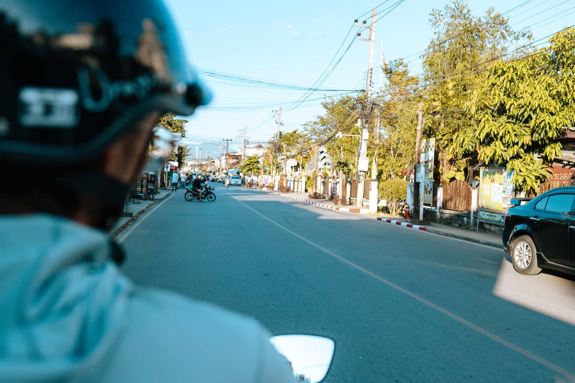 Trey riding motorbike in Pai Thailand