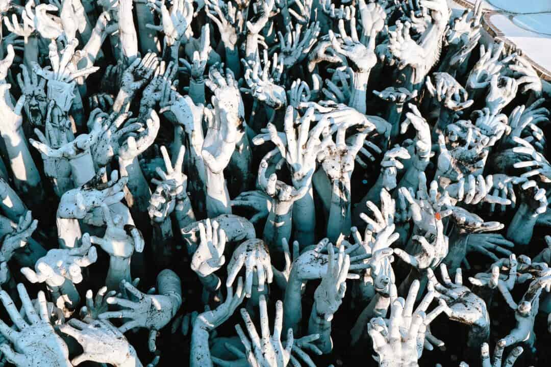 White Temple hands reaching up