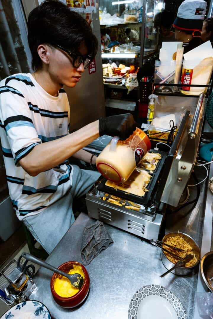 Pouring Sponge cake batter at 20 Thuoc in Saigon