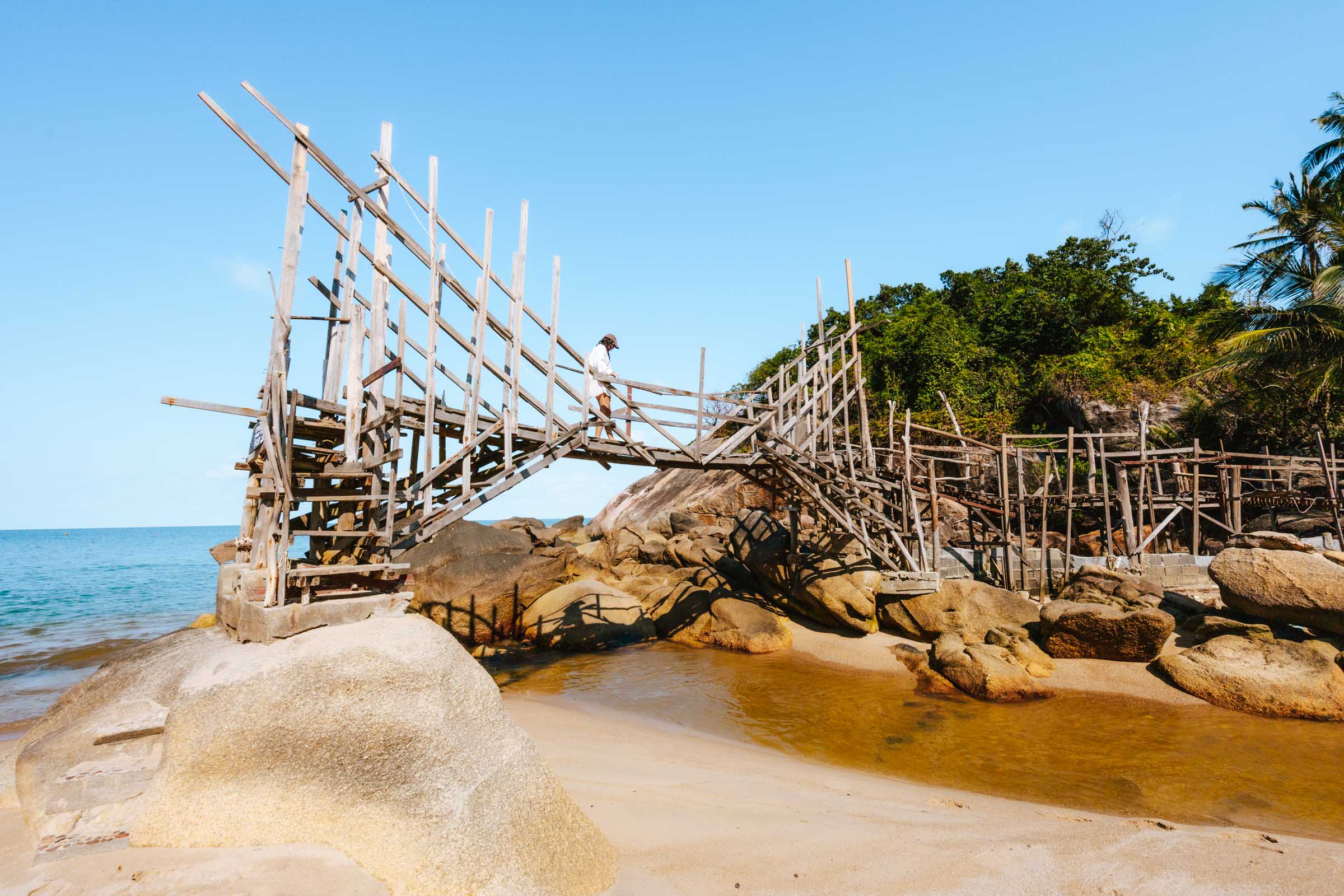 Walking on wooden bridge at Haad Sadet