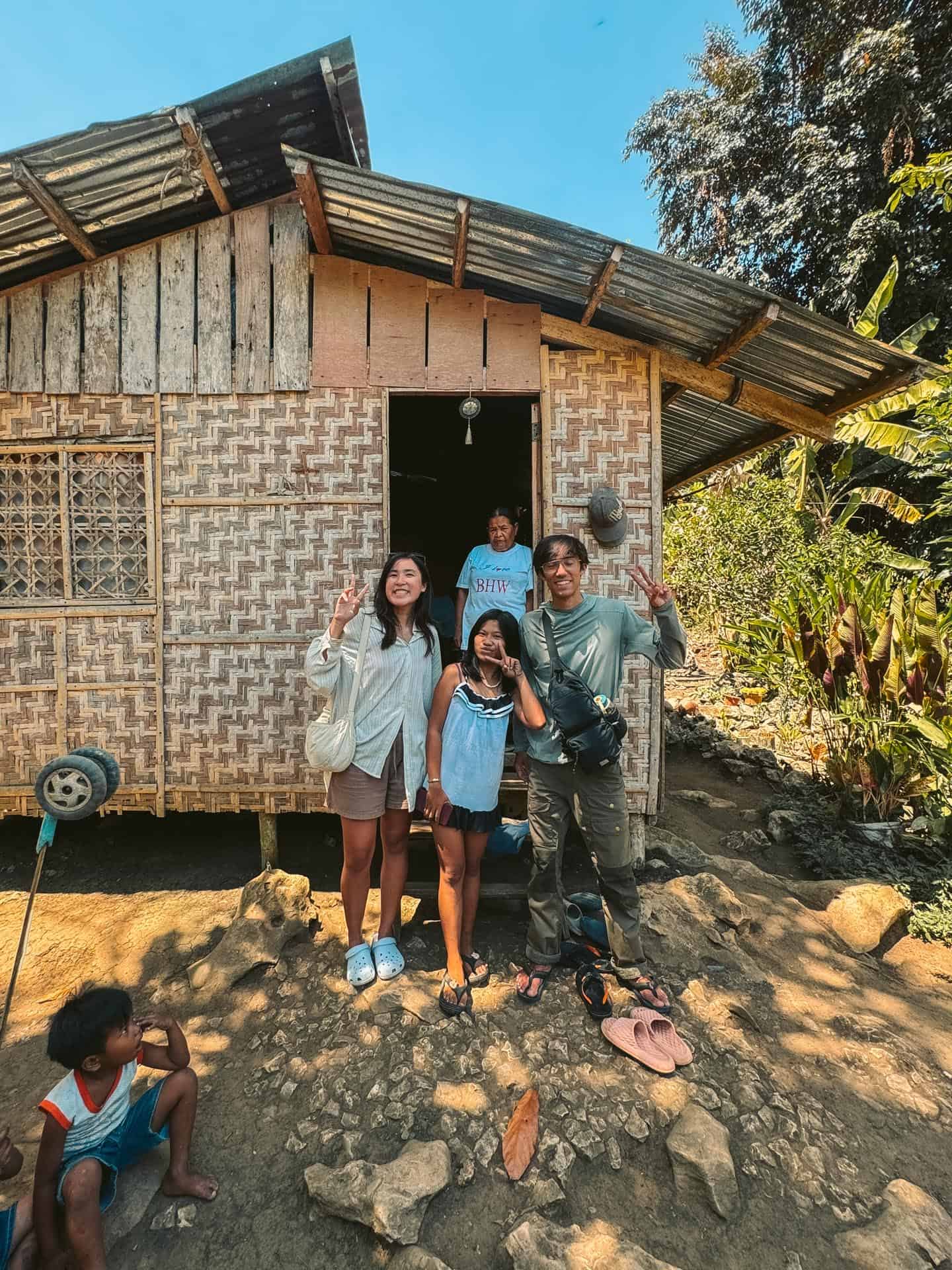 Taking photo with guide's daughter at Princess Manan-aw Cave in Bohol, Philippines