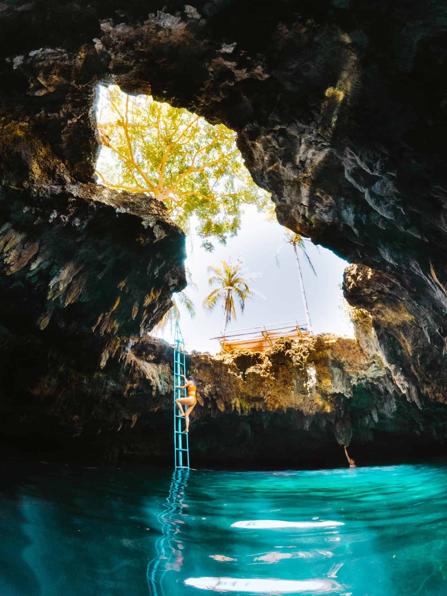 Climbing ladder in Cabagnow Cave Pool