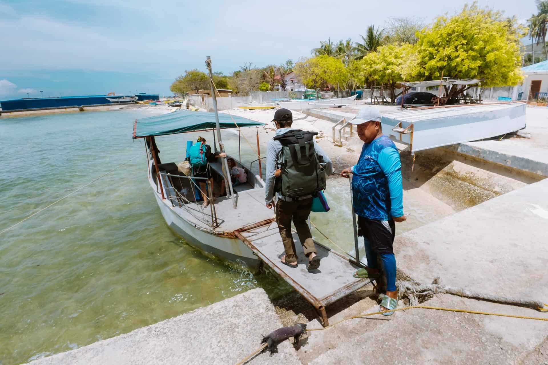 How to Get from Oslob to Bohol by Ferry: Complete Guide 4 Boarding the small boat to the Oslob to Bohol Ferry