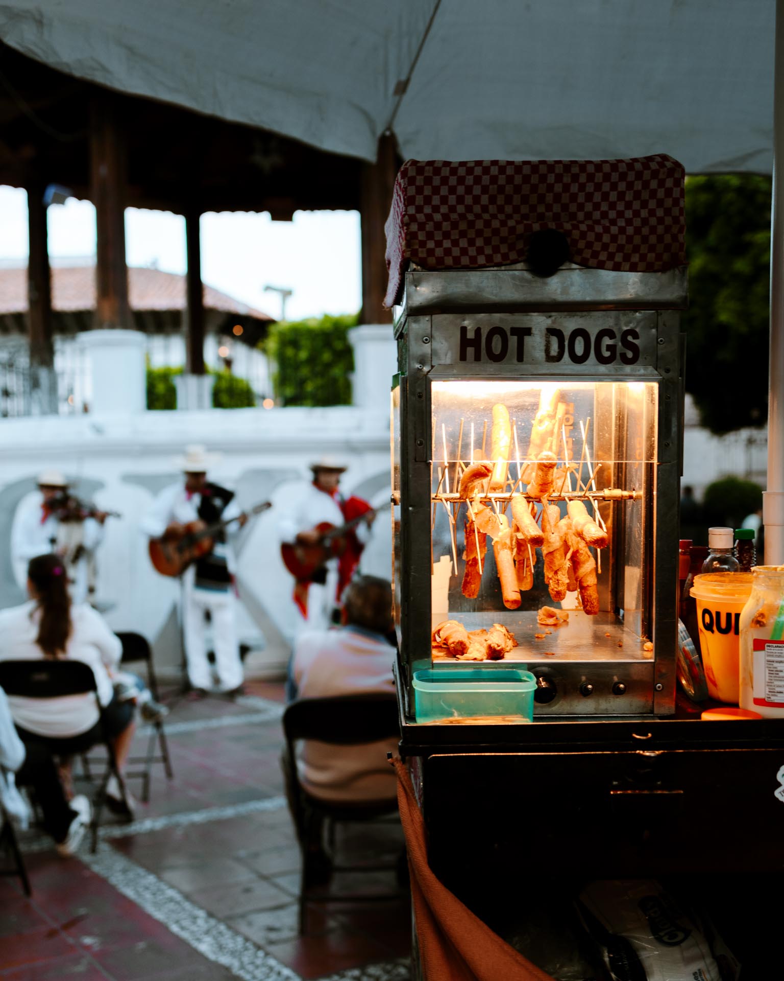 Street food and mariachi band in Taxco Mexico zocalo