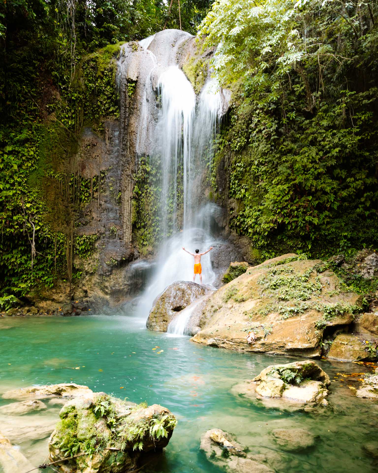 Under waterfall at Pahangog Falls