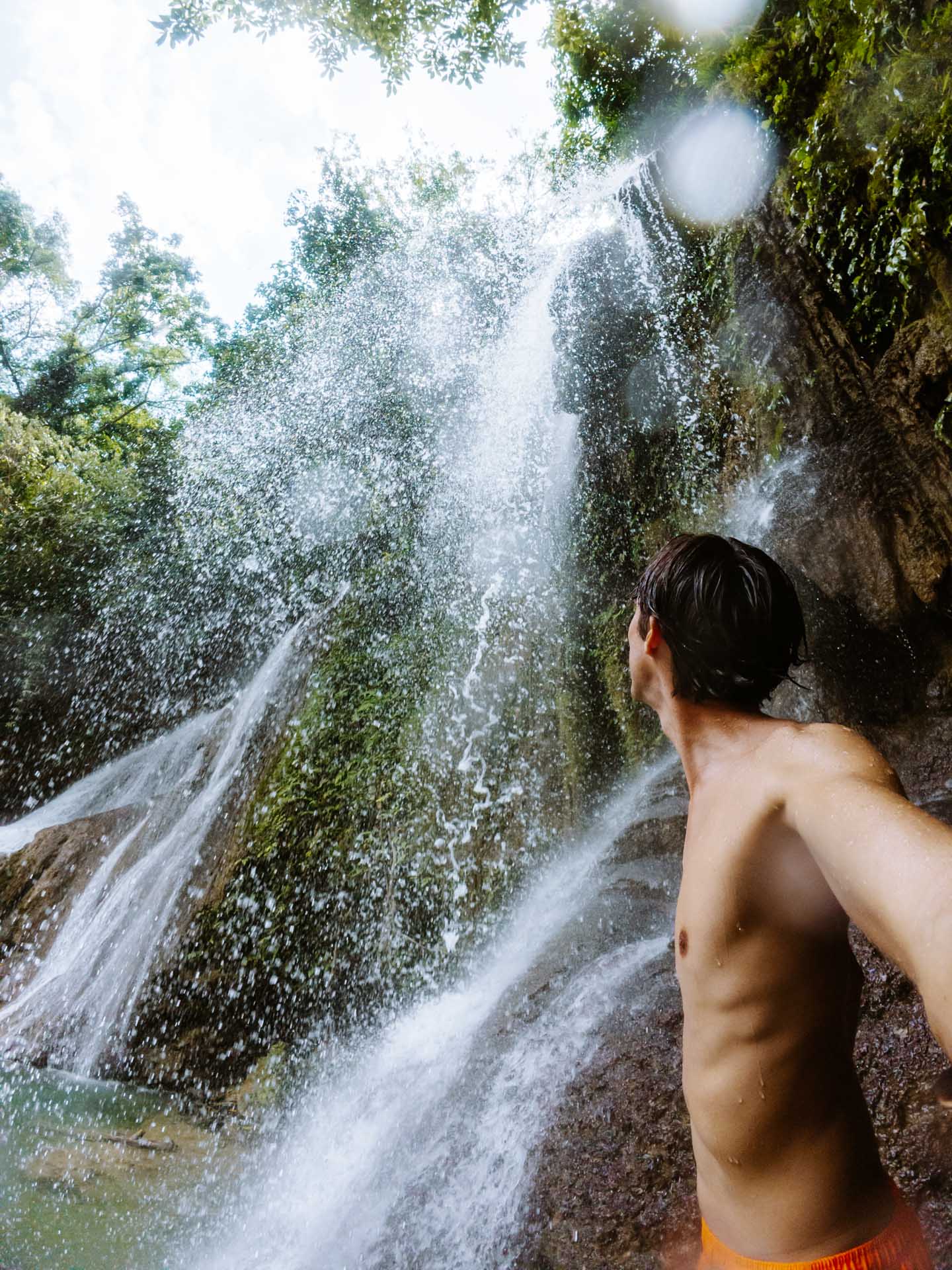Underneath waterfall in Pahangog Falls