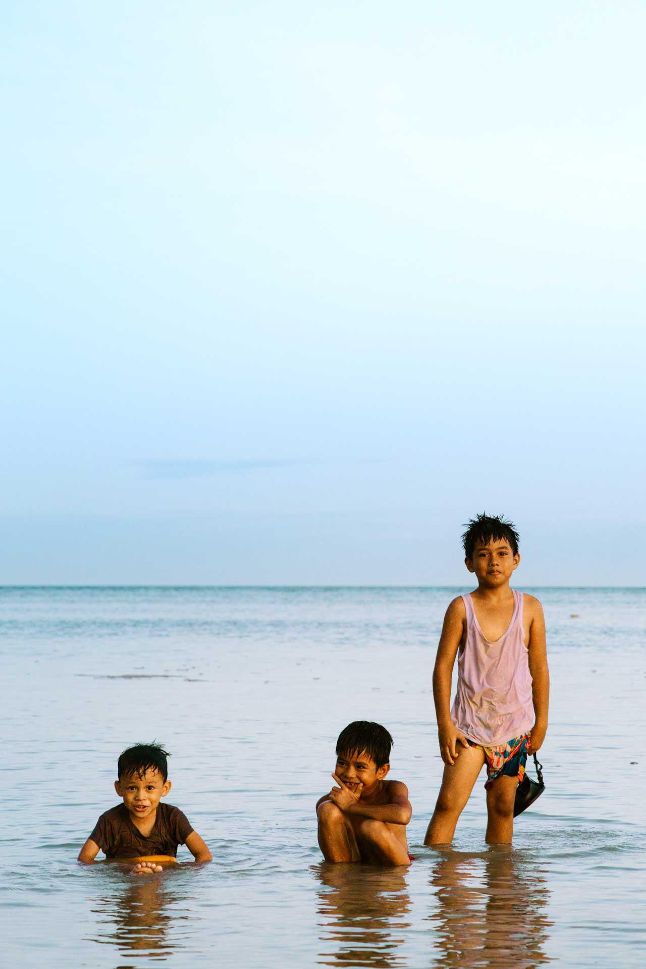 Children playing at White Beach in Bohol Philippines