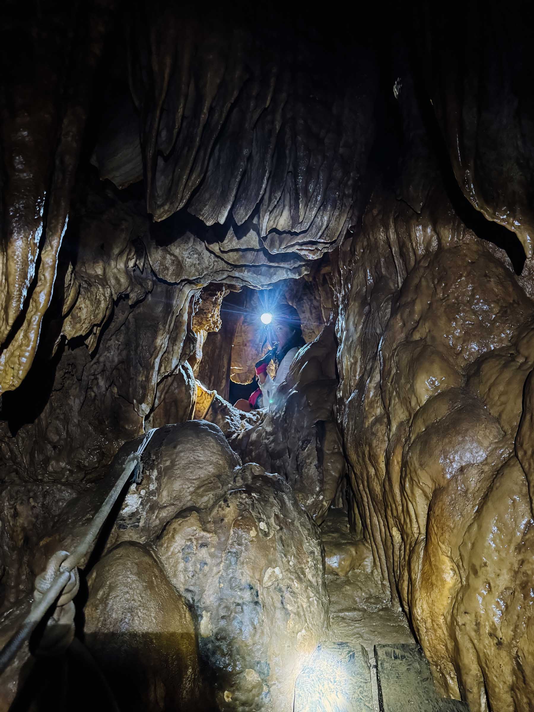 Narrow passageway in Somyot Cave in Siargao