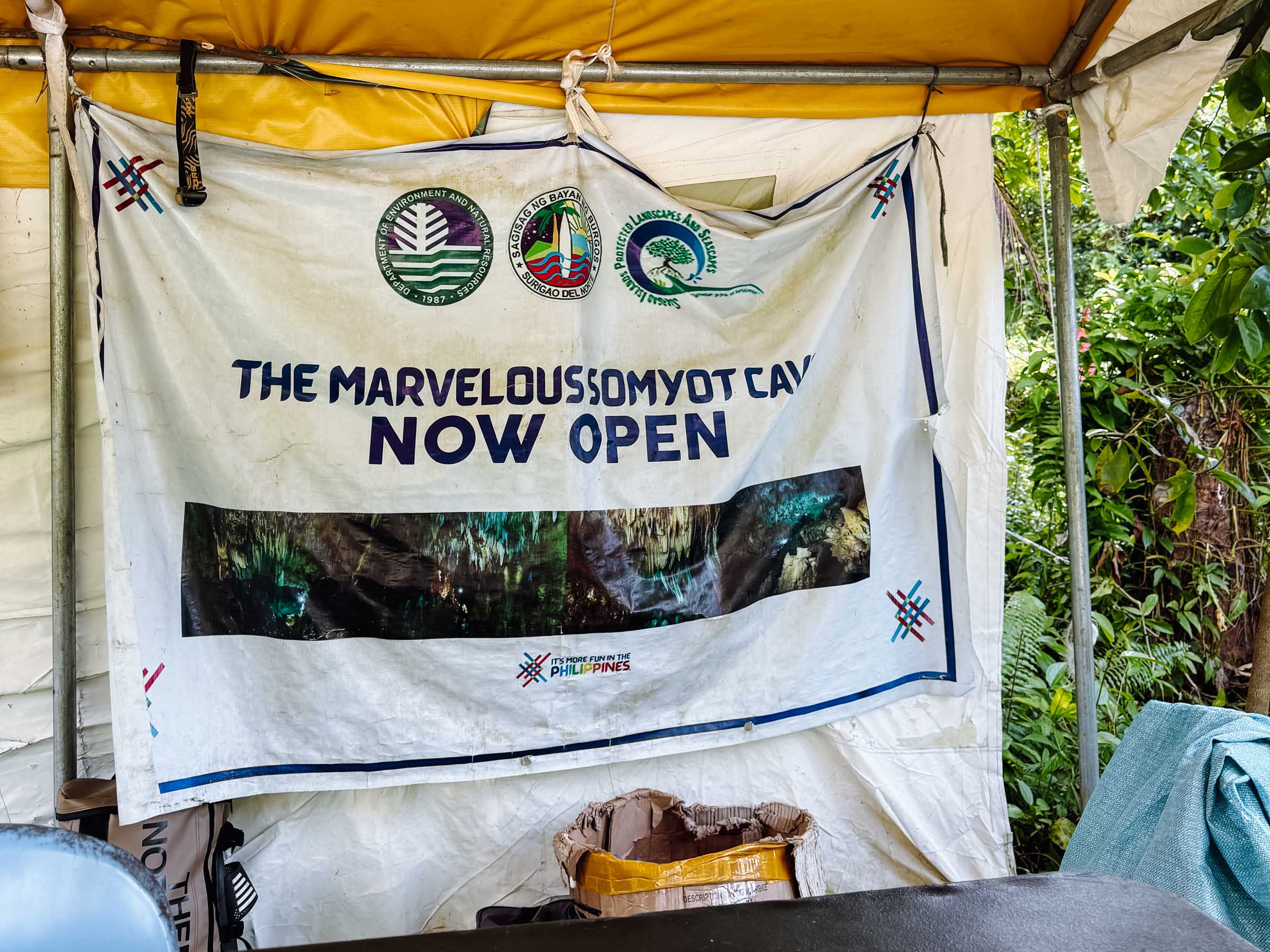 Sign in booth for Somyot Cave