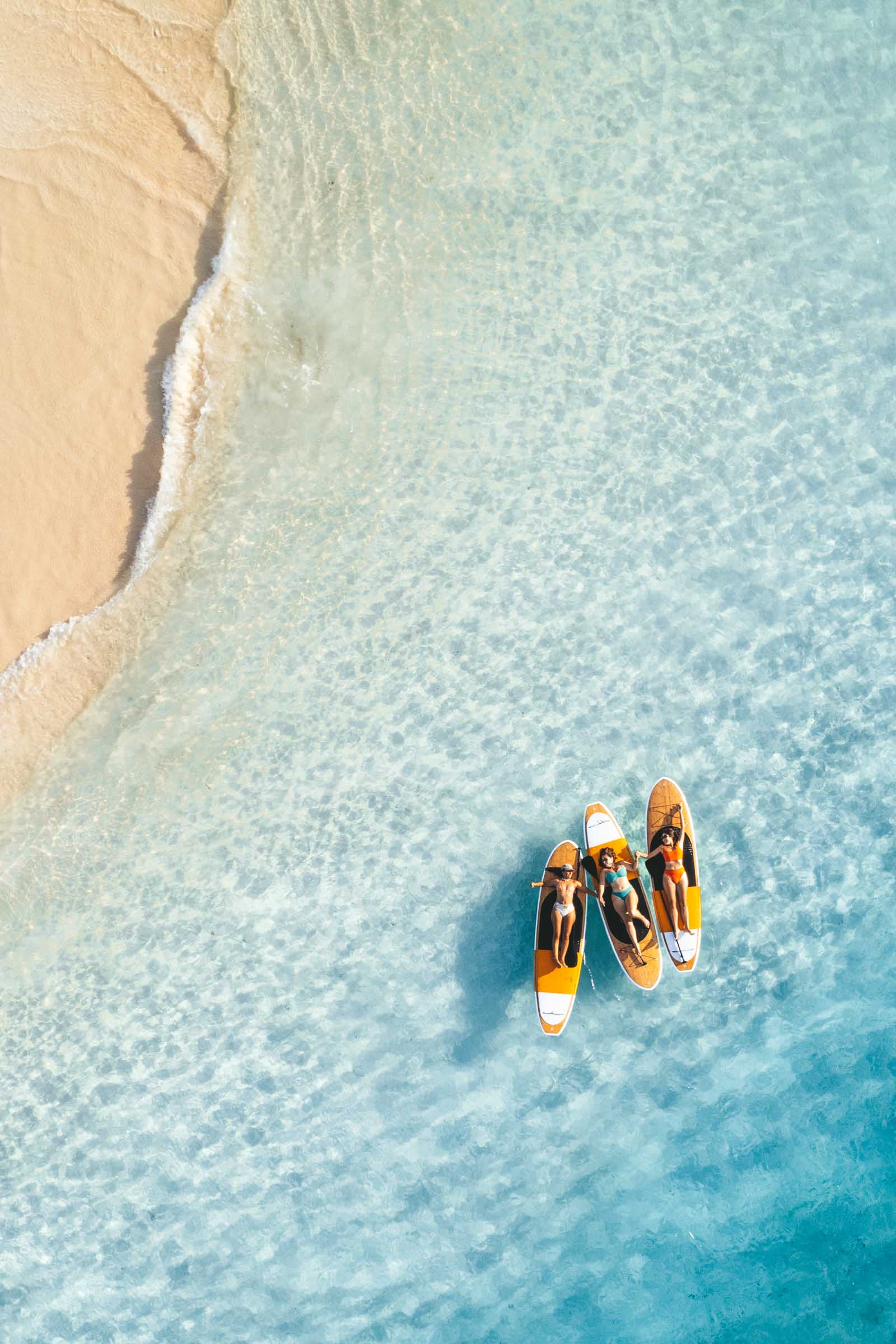 Girls on Surfboards at beach in Siargao
