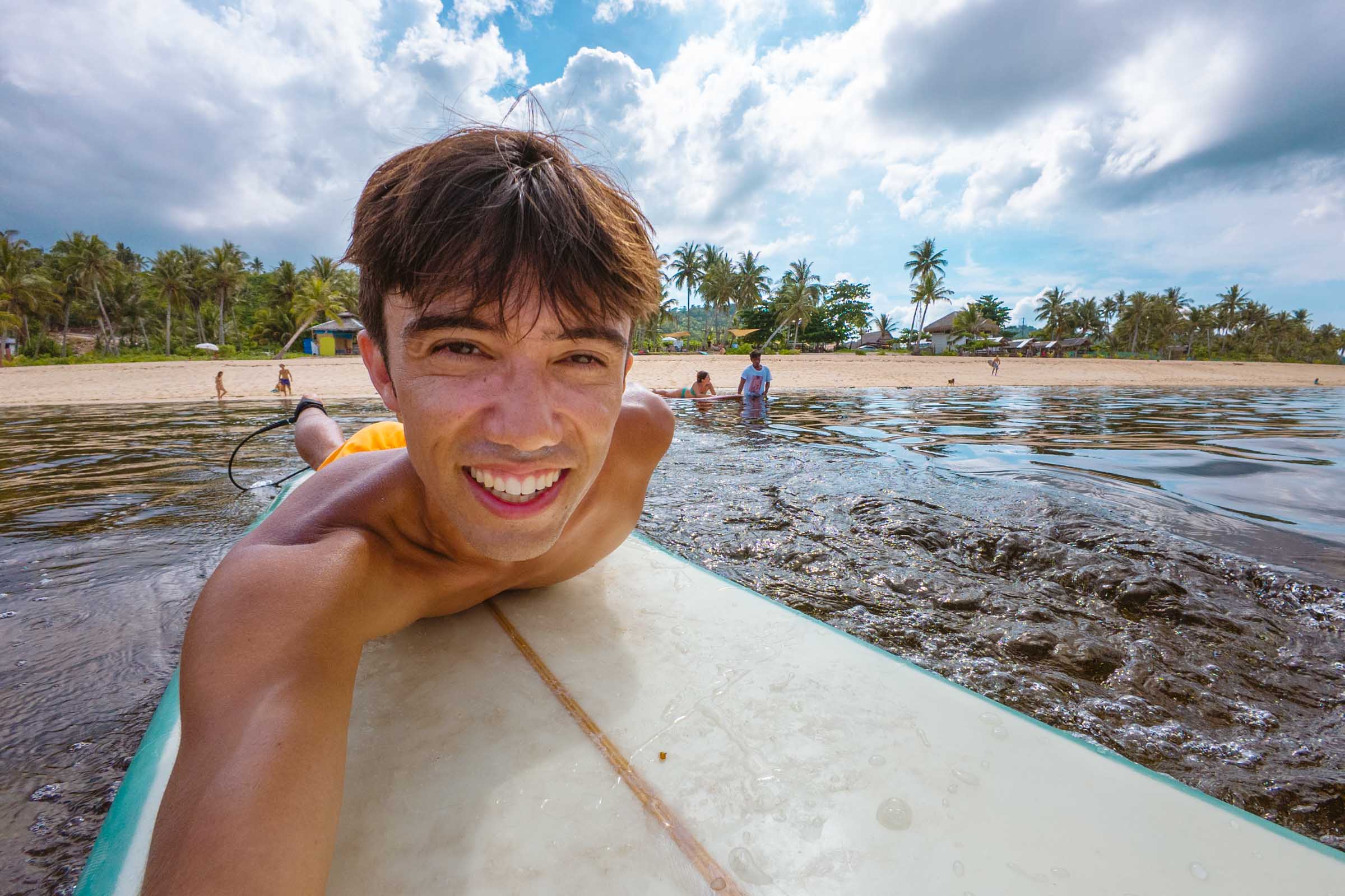Surfing at Pacifico Beach Siargao