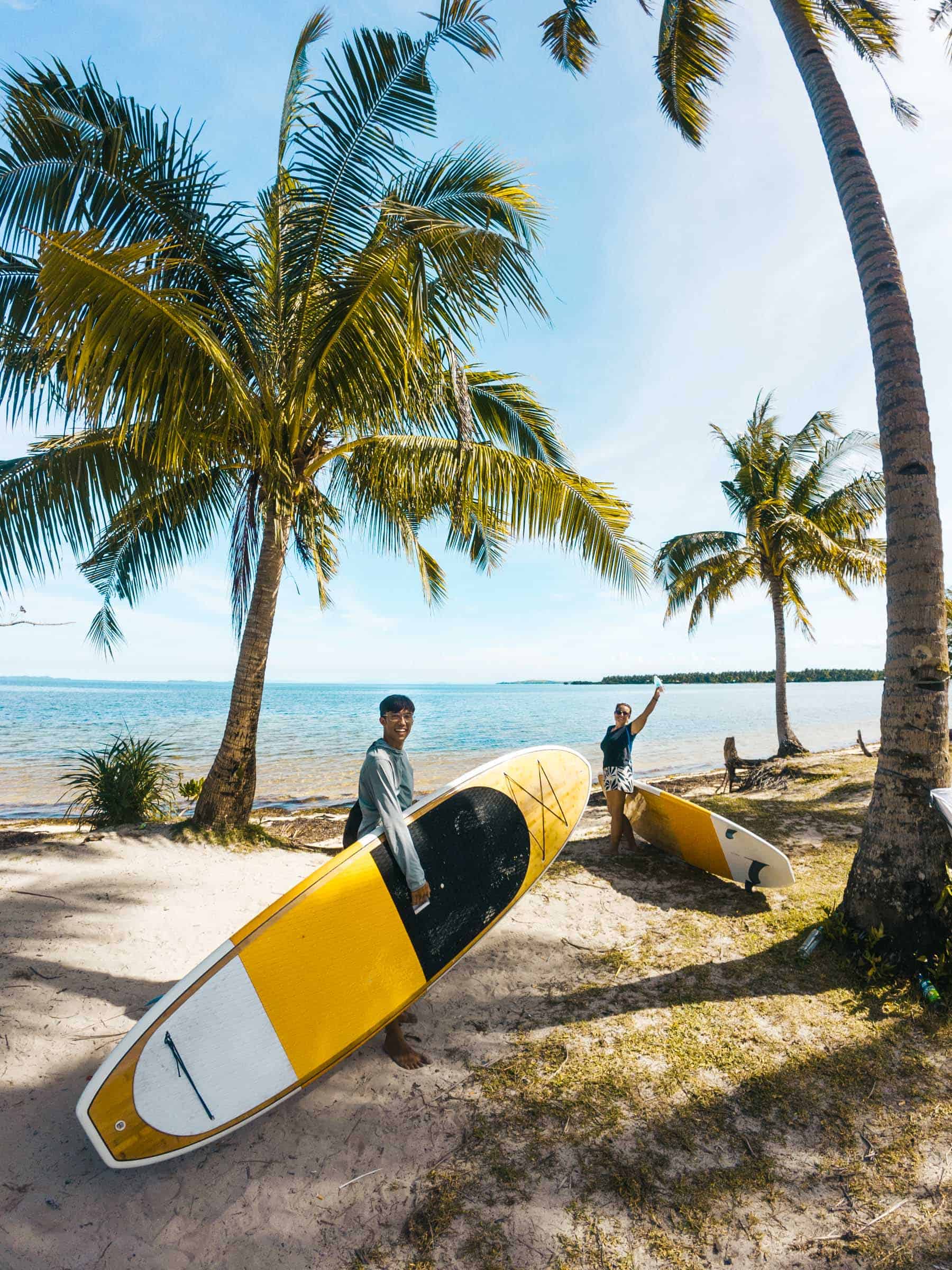 Where to Stay in Siargao: Our Guide to the Best Areas and Hotels 5 Trey with paddleboard in Malinao Siargao