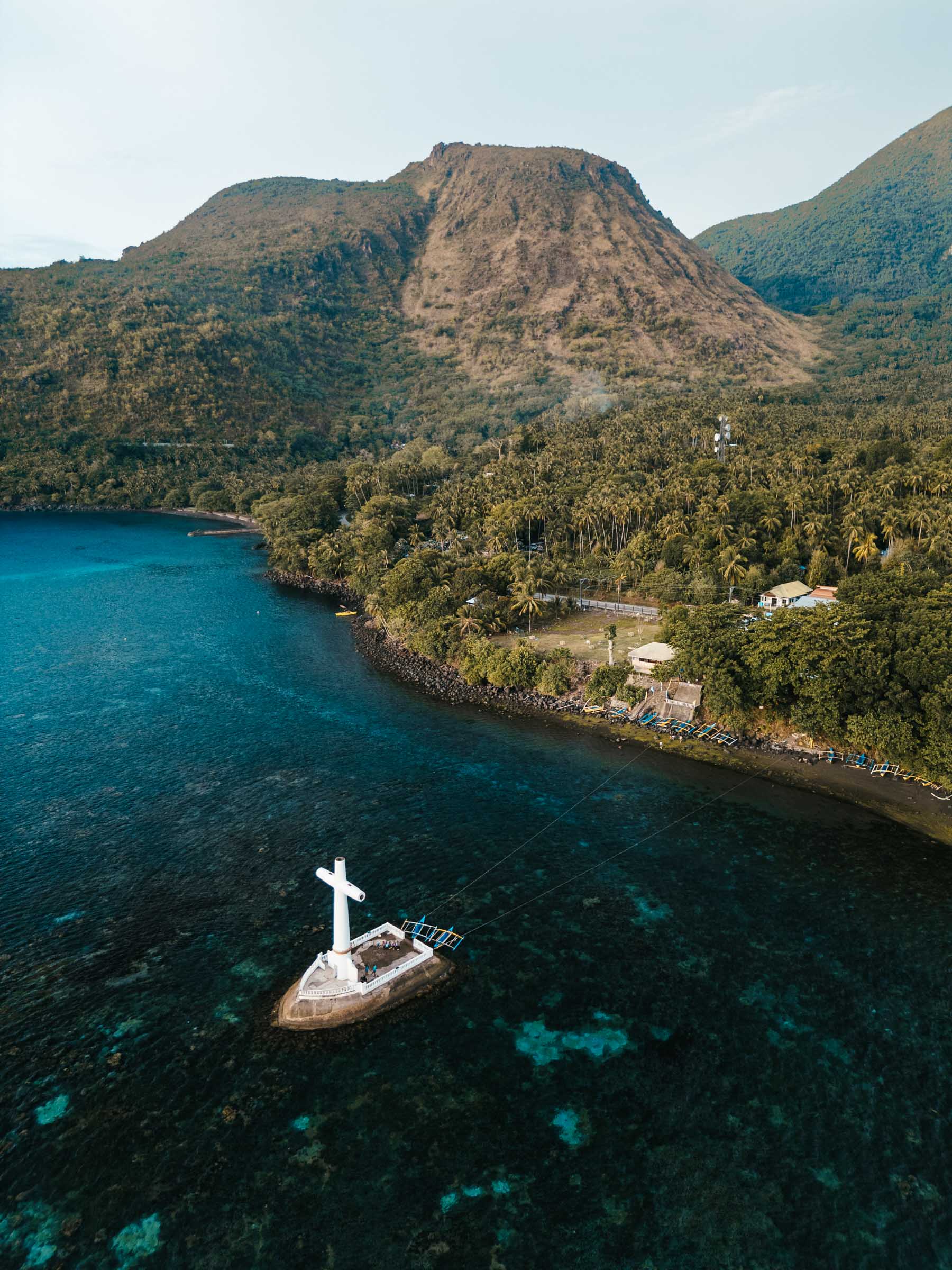 16 Awesome Things to Do in Camiguin: Complete Travel Guide 2 Sunken Cemetery Camiguin with Mount Vulcan