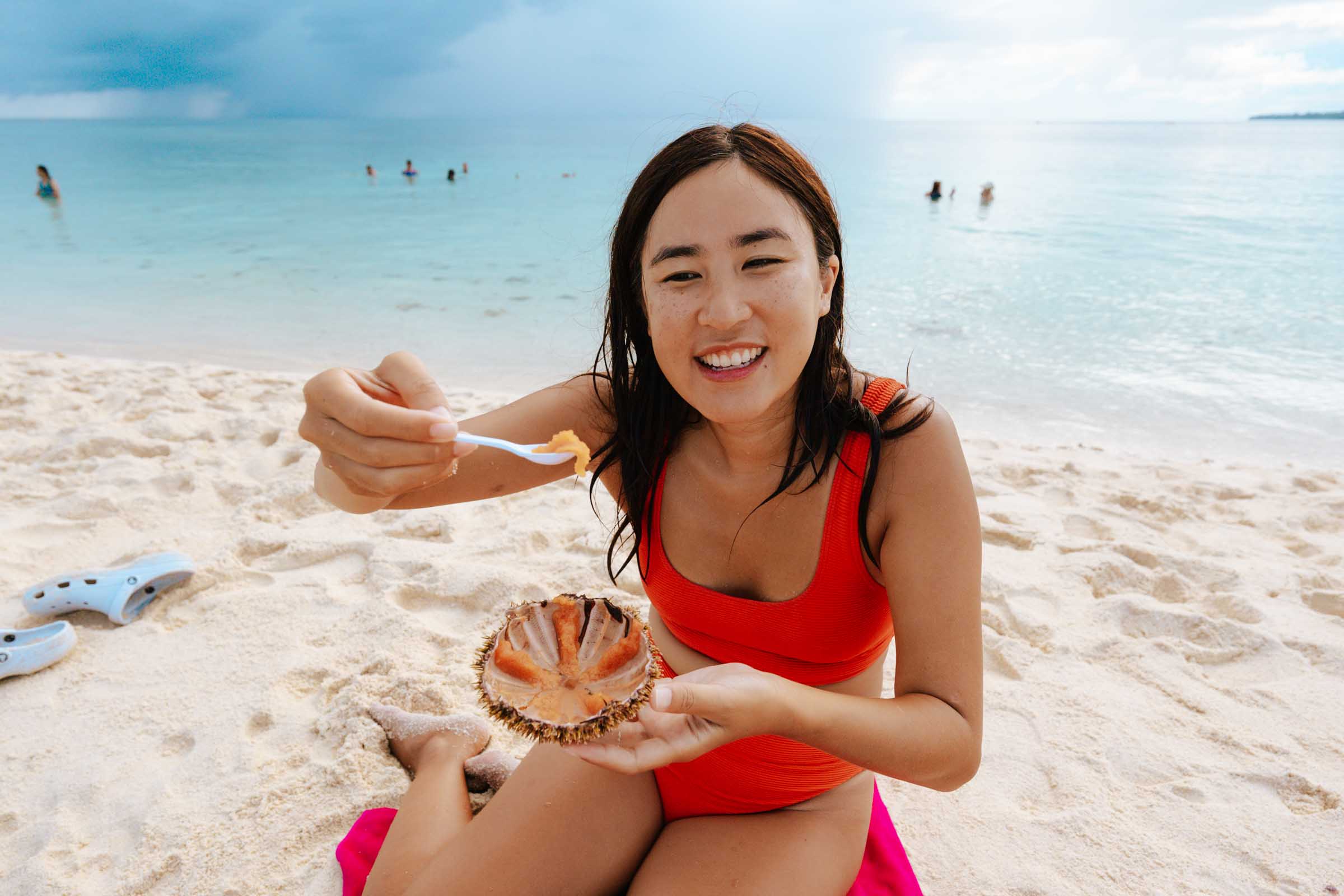 Eating sea urchin at White Island Camiguin