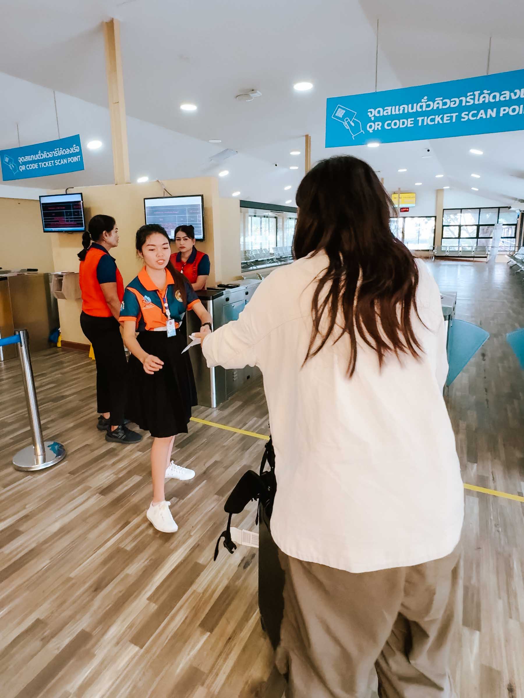 Scanning ticket to board Koh Phangan Fery