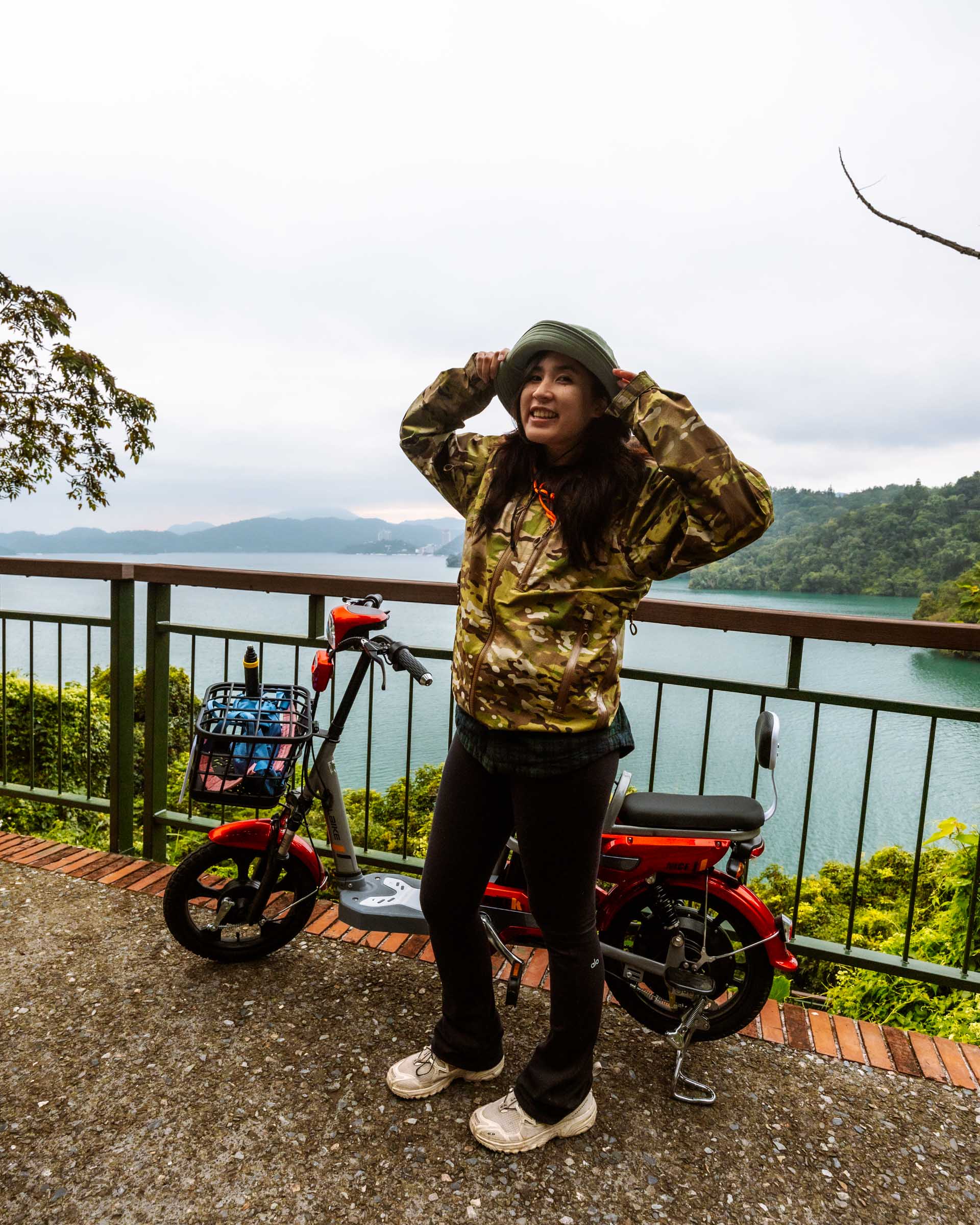 Chloe with bicycle at Sun Moon Lake