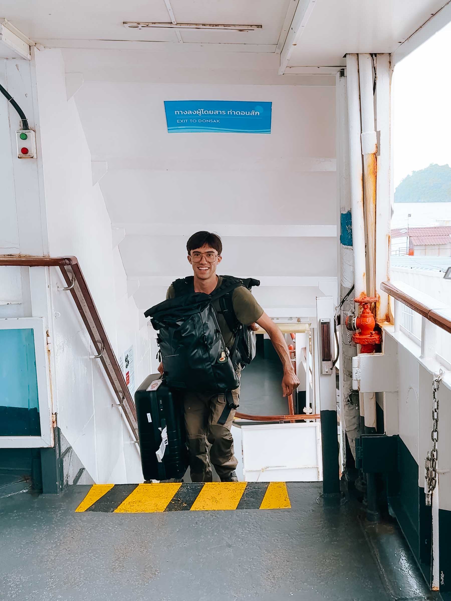 16 Incredible Things to Do in Koh Phangan: Complete Travel Guide 60 Trey boarding the Seatran ferry to Koh Phangan