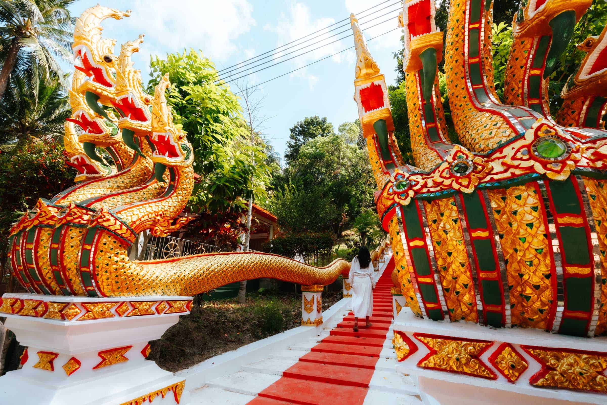 Wat Maduea Wan Koh Phangan red and white stairs