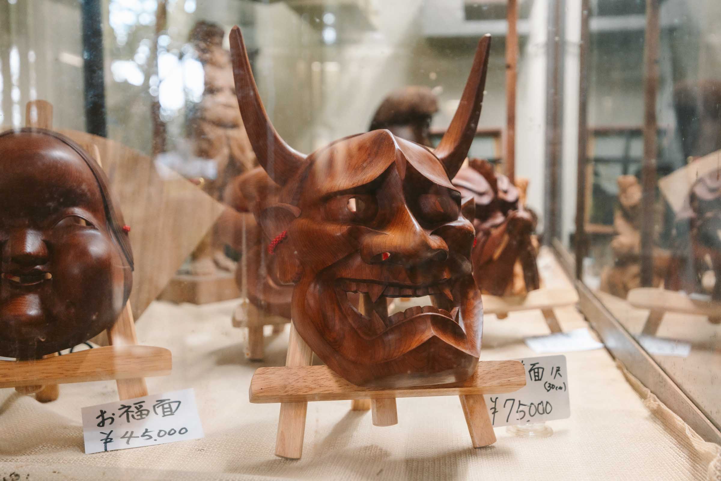 Hida Folk Village (Hida no Sato) in Takayama: Complete Guide 14 Wooden mask crafts at Hida Folk Village