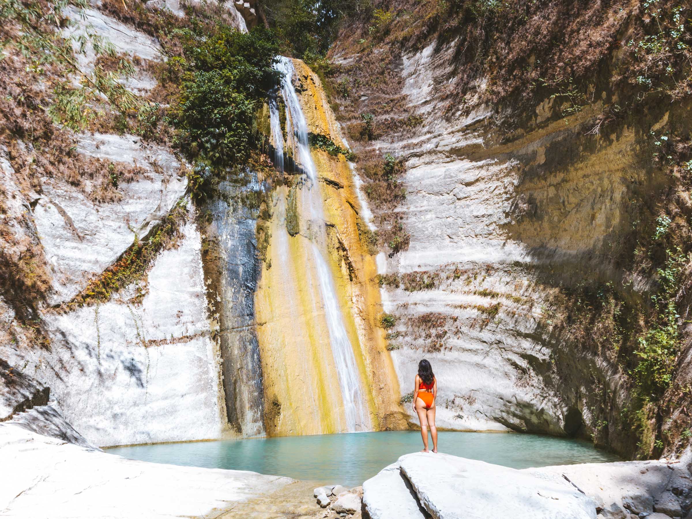 Dao Falls Cebu standing on rock