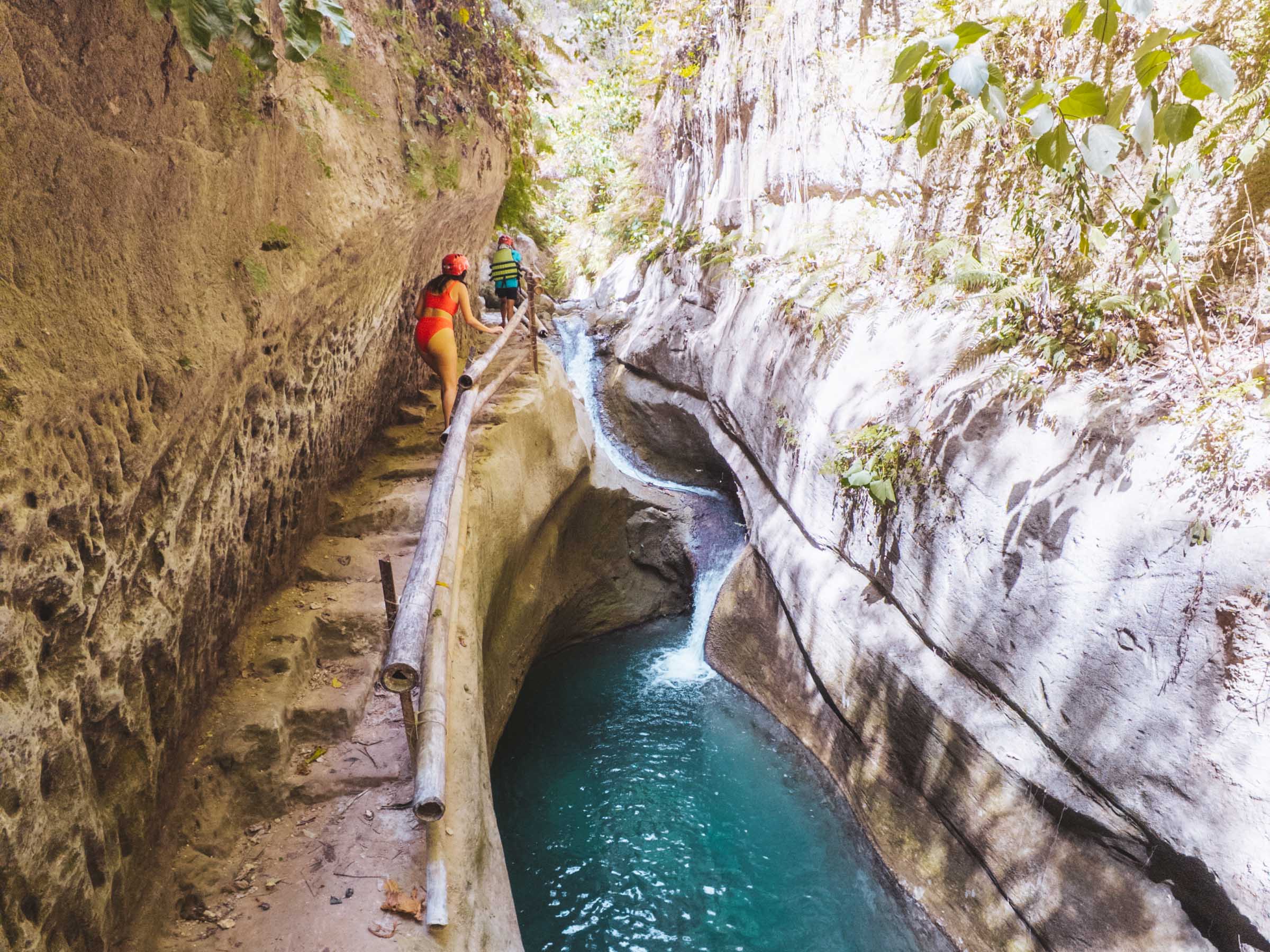 Climbing stone steps to Dao Falls Cebu
