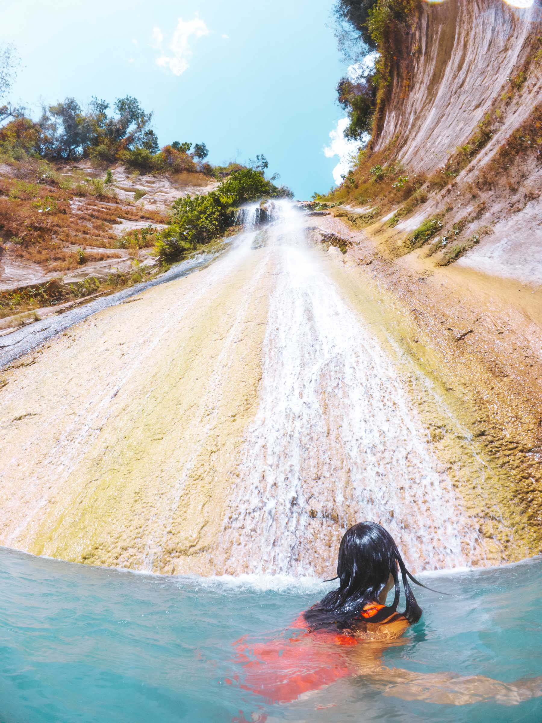 3 Days in Cebu: The Perfect Cebu Itinerary 18 Swimming underneath waterfall at Dao Falls Cebu