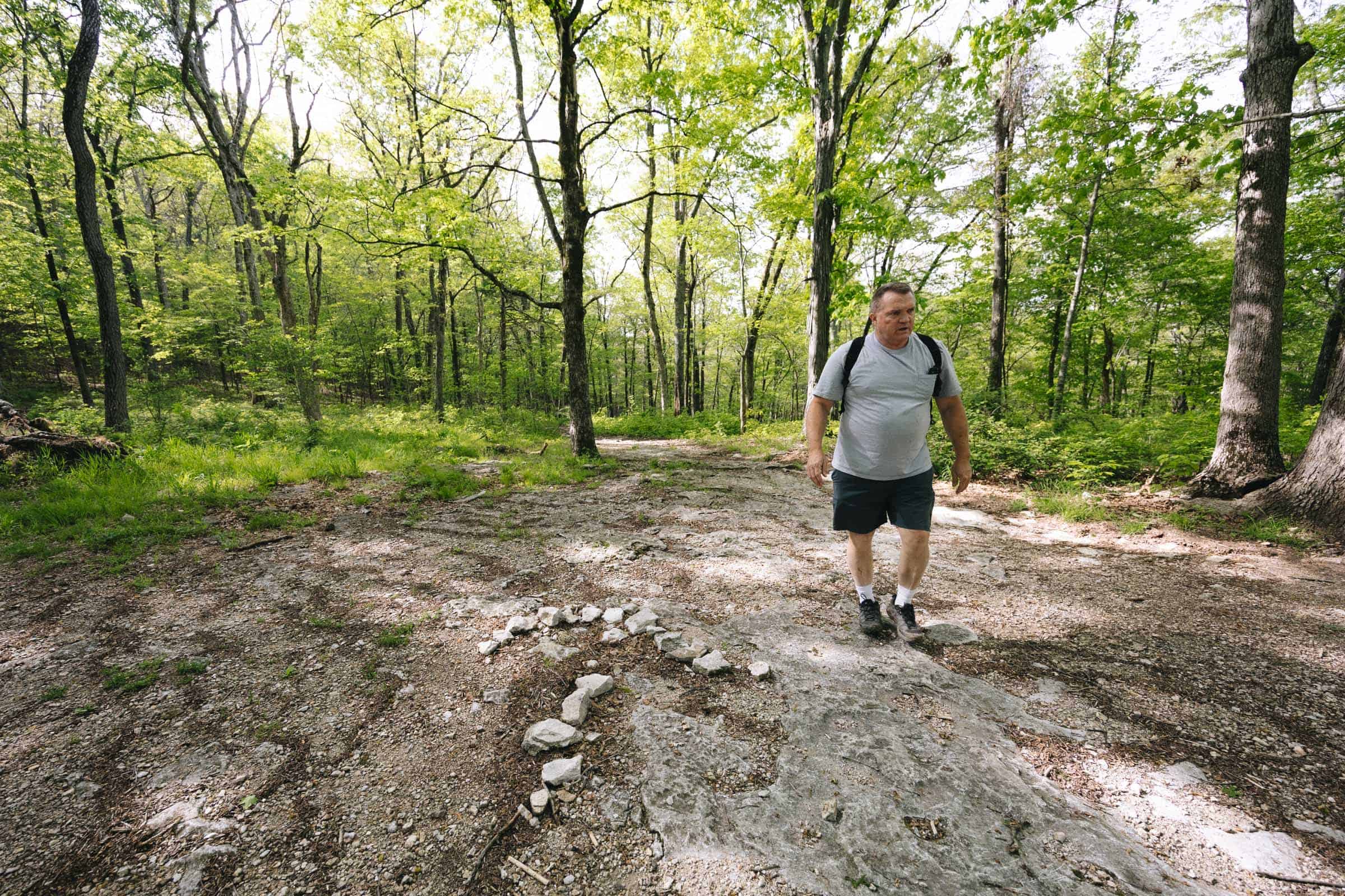 Arrow on ground pointing to Goat Trail on Centerpoint Trail