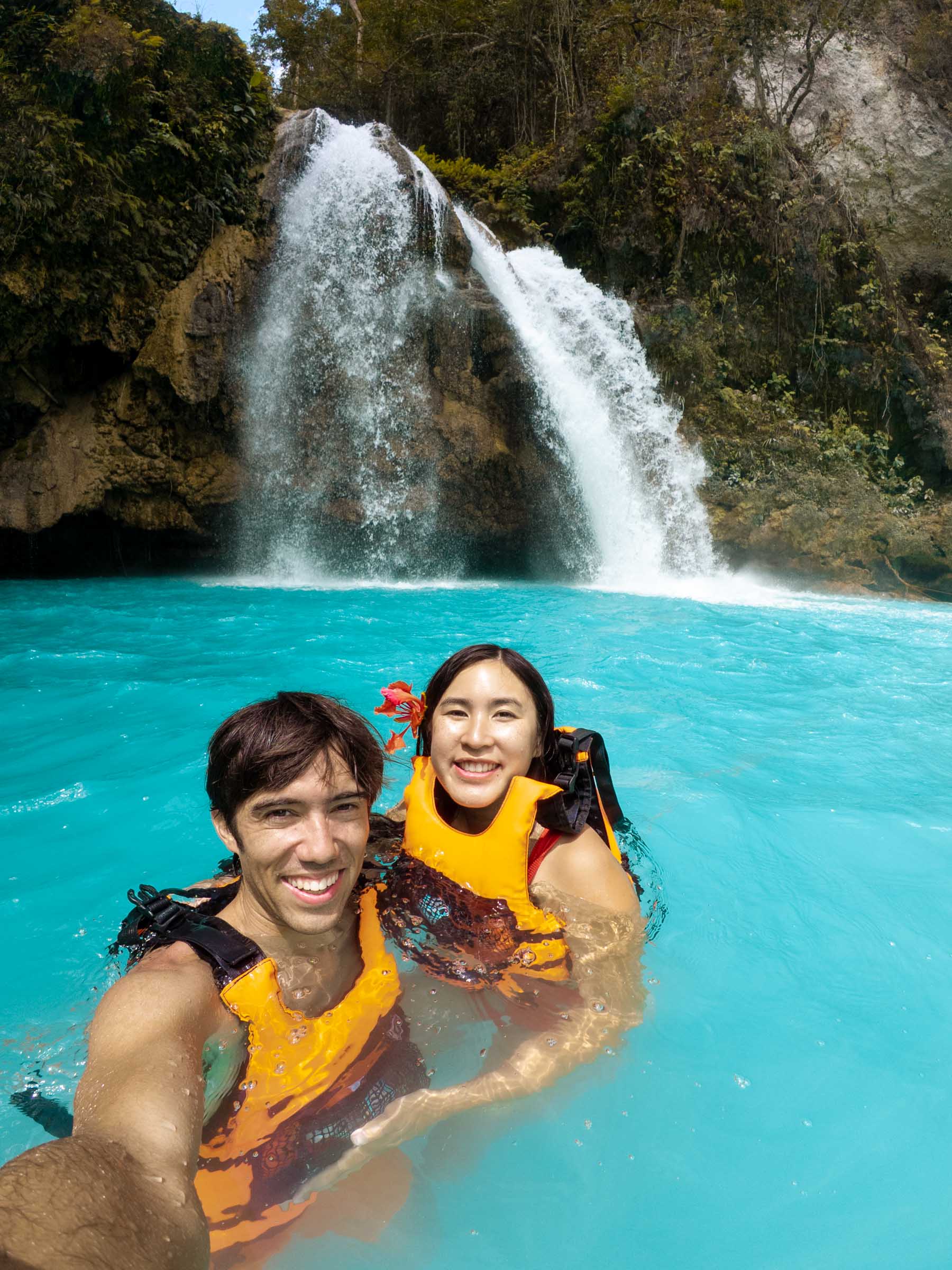 Chloe and Trey swimming at Kawasan Falls Cebu