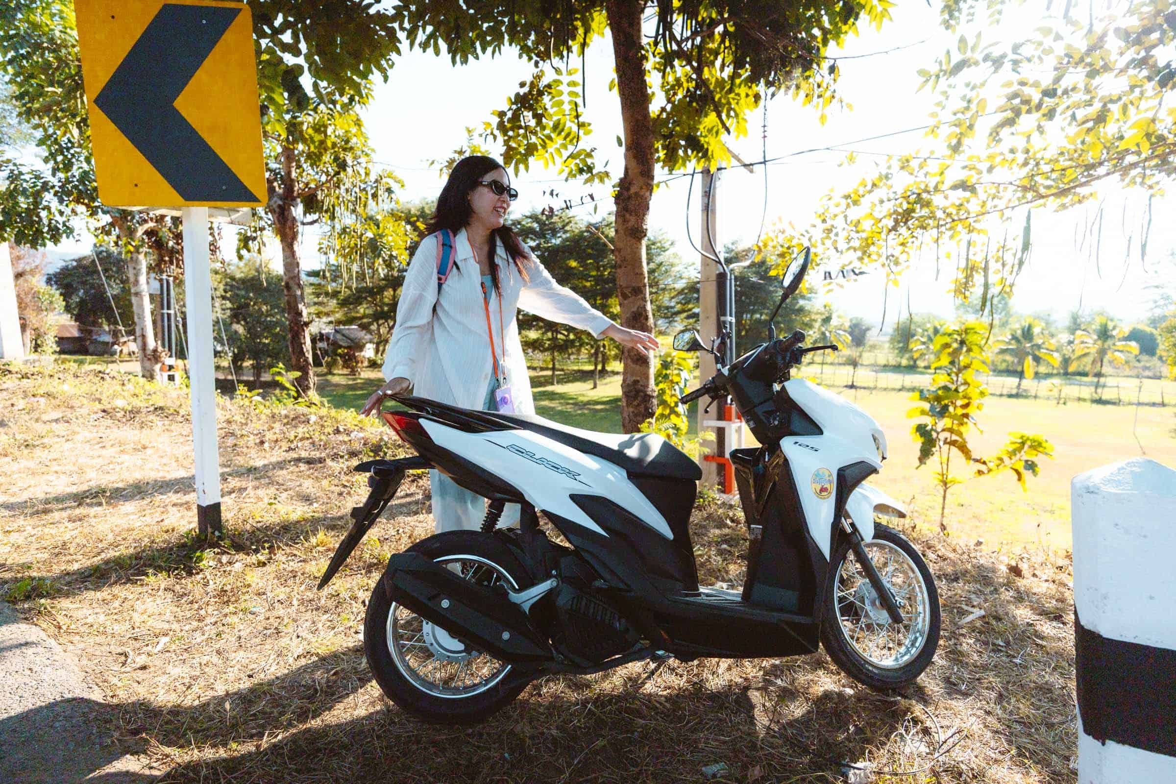 Chloe with motorbike in Pai