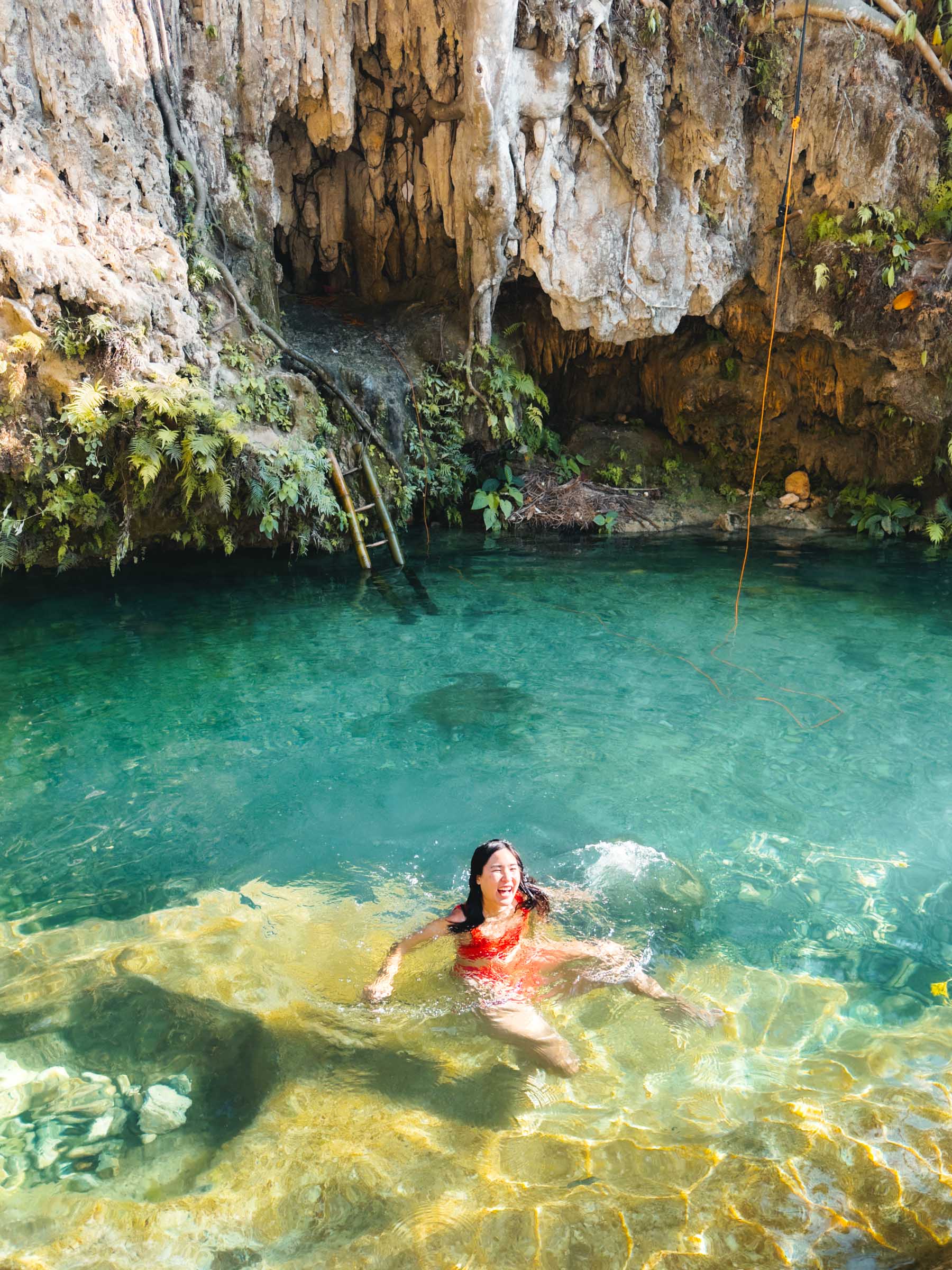 girl swimming kanlaob falls cebu