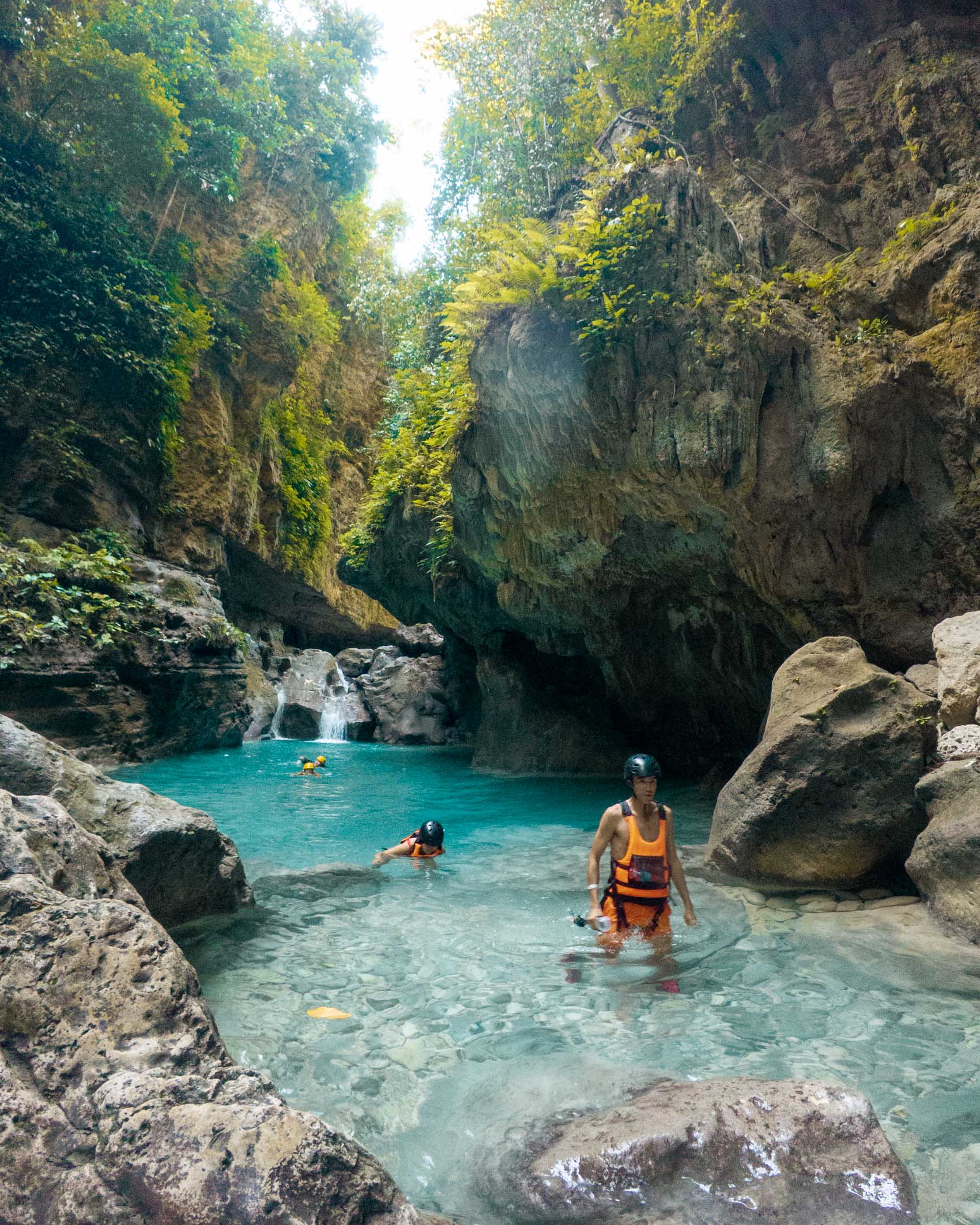 Navigating through Kawasan Falls Canyoneering