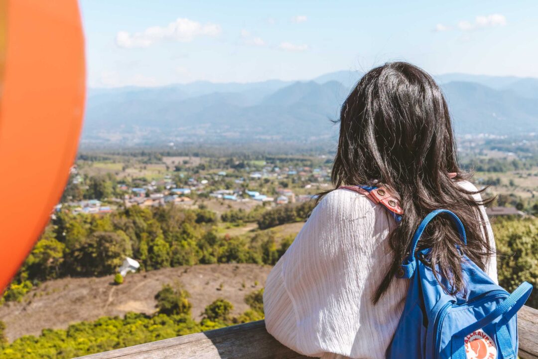 Chloe with mountain view at Yun Lai Viewpoint in Pai