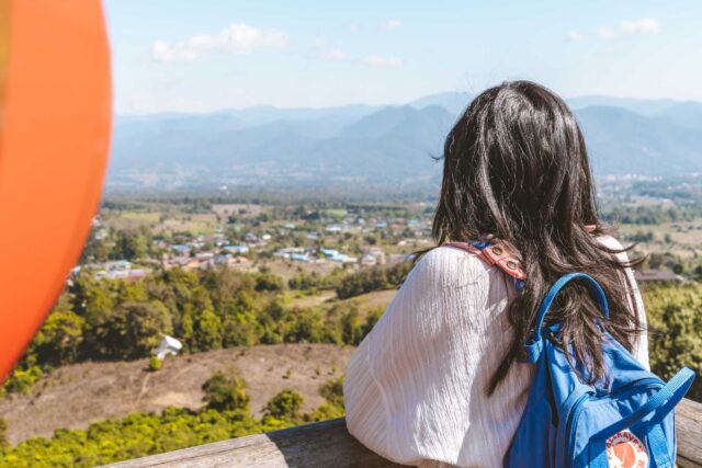 Chloe with mountain view at Yun Lai Viewpoint in Pai