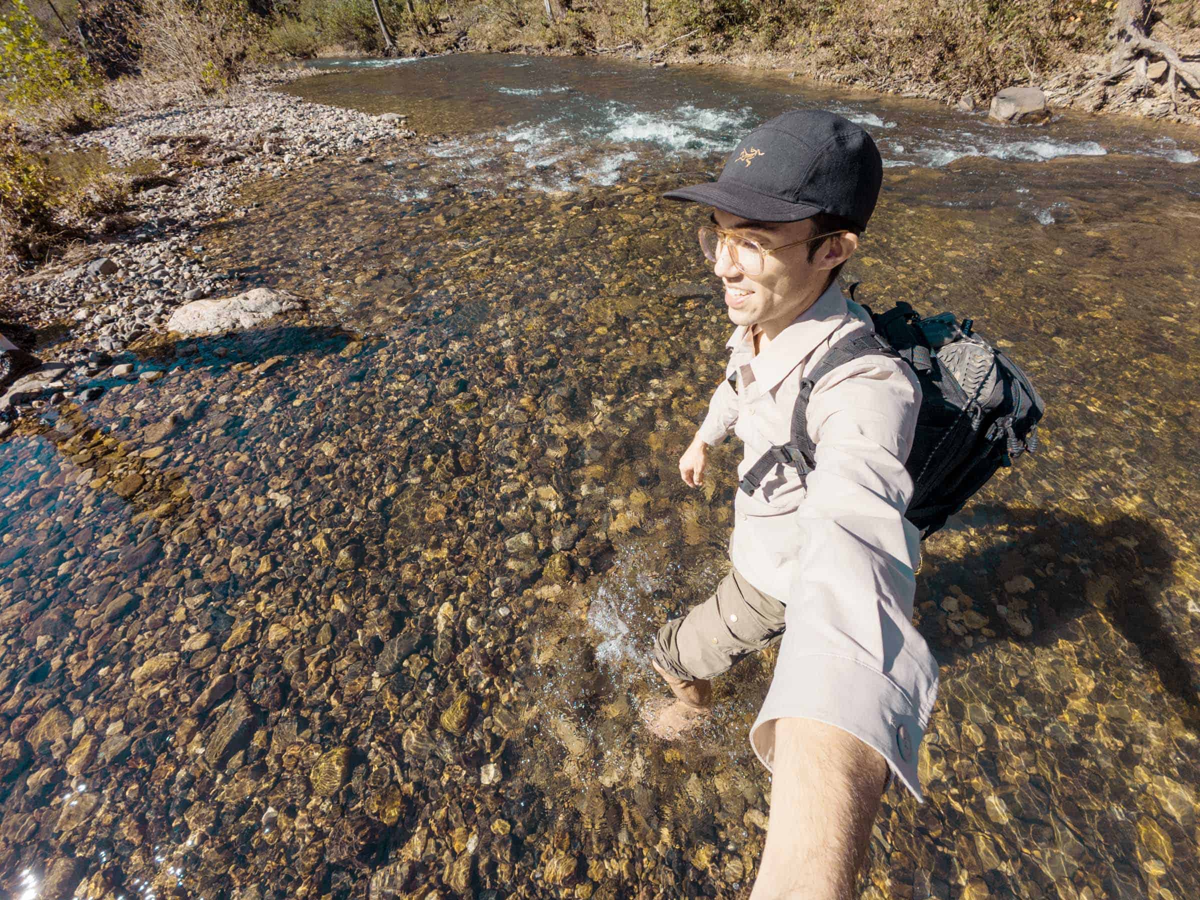 Trey crossing the Little Missouri River to Winding Stairs