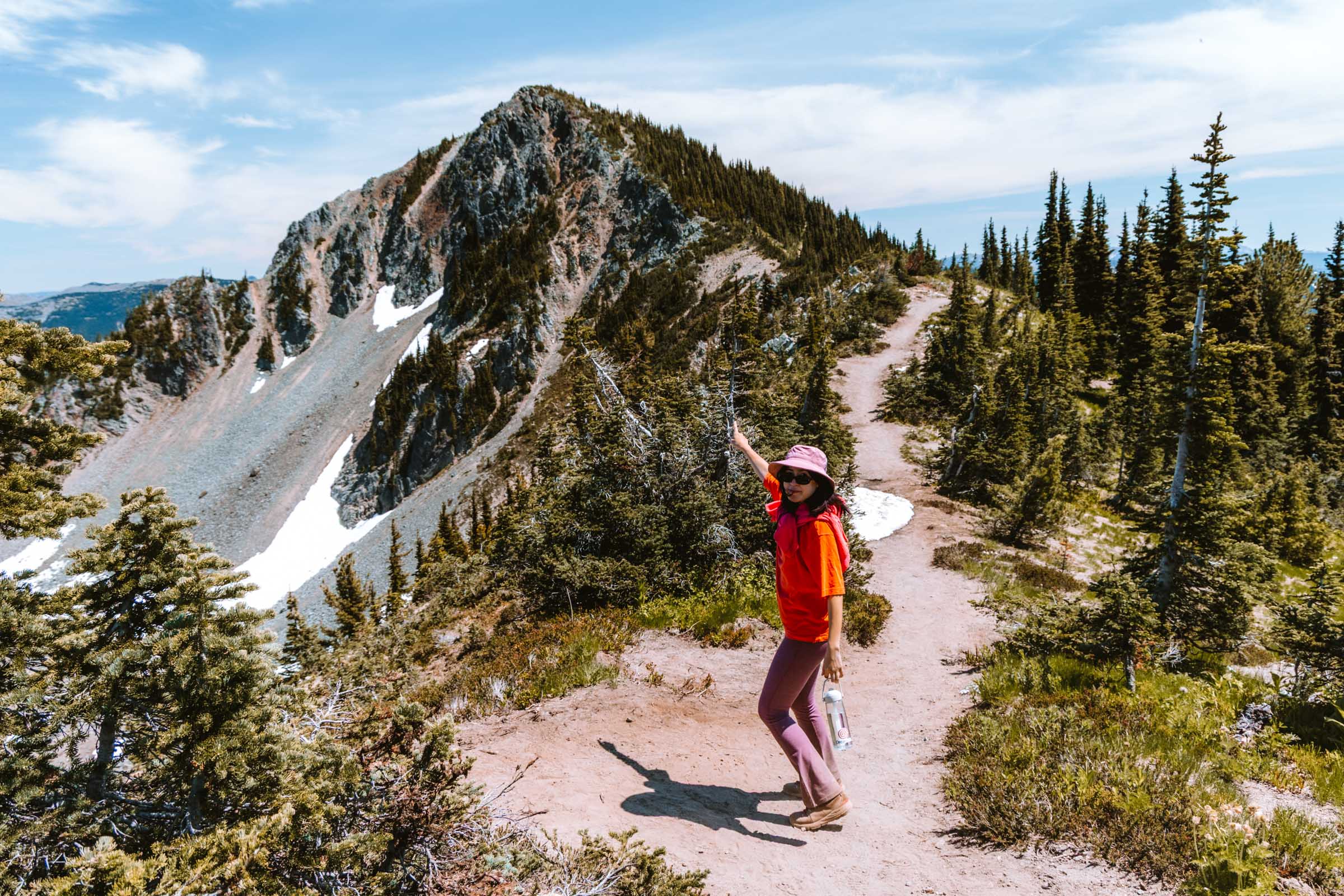 Chloe pointing at Dege Peak